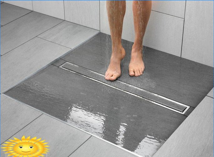 Desagüe de ducha debajo de las baldosas: reglas de diseño e instalación.