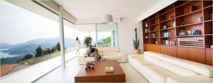 Diseño interior de una casa con impresionantes vistas al lago por Philipp Architekten, Suiza