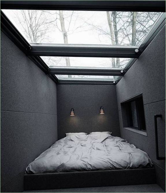 Diseño interior de una casa de paneles con tejado de cristal